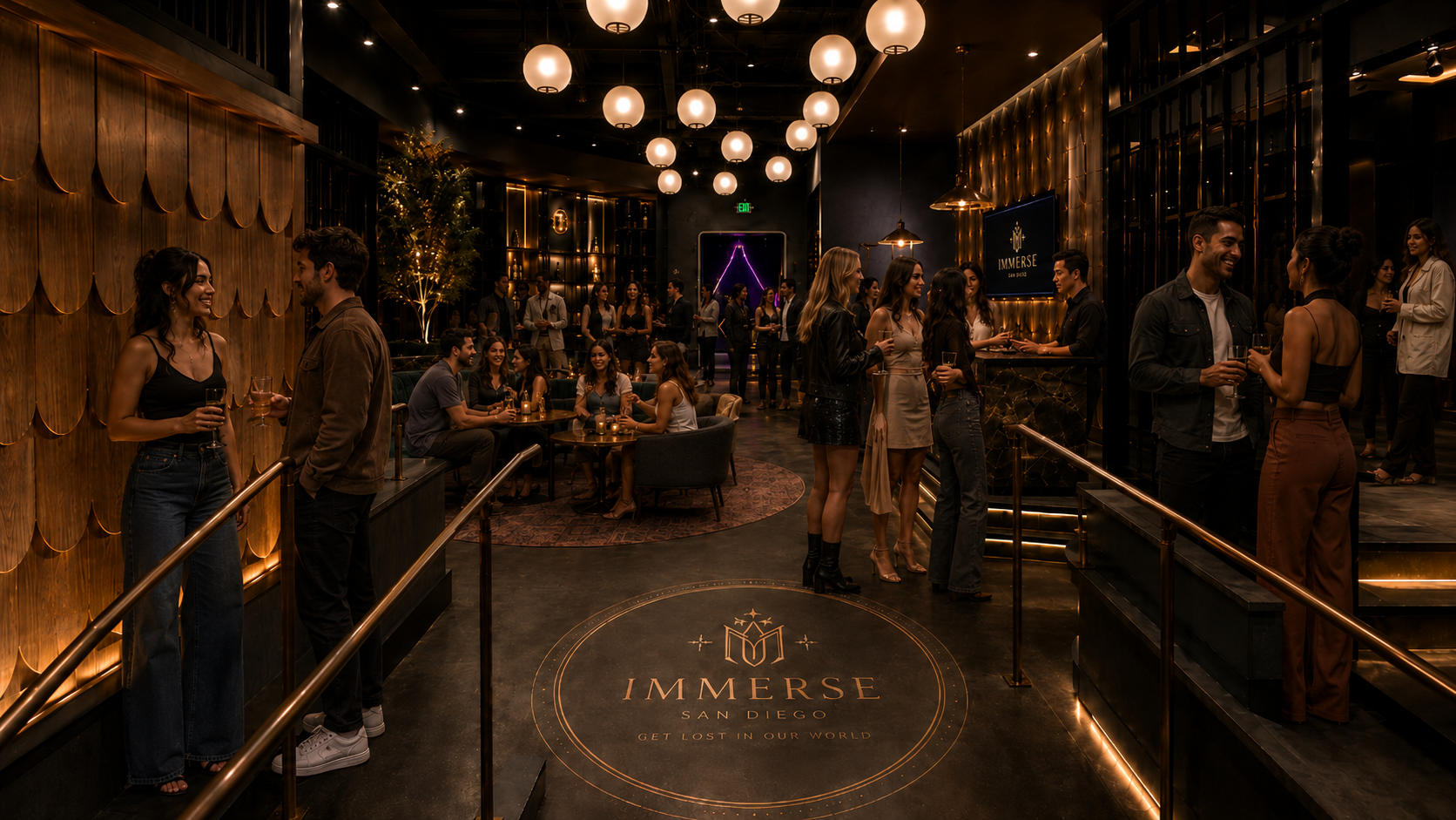Immerse San Diego lobby-lounge with guests mingling beneath globe pendant lights and the crest on the floor